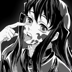 an anime character with black hair and makeup pointing to the side while holding a cell phone