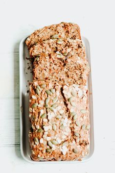 sliced loaf of bread with seeds on top