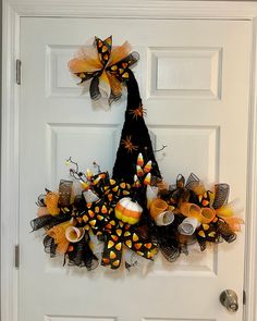 a halloween wreath on the front door