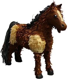 a brown and black horse standing on top of a white floor next to a wall