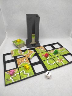 a board game with dices and blocks on the ground