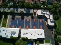 an aerial view of a basketball court and parking lot