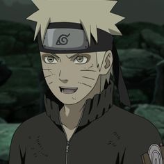 naruto from the anime naruto is wearing a black hoodie and has his eyes wide open