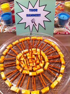 there is a plate that has some food on it and the sign says thor hammers