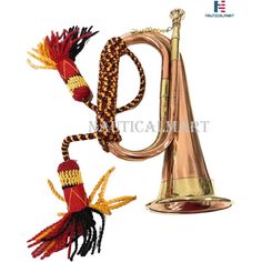 an image of a musical instrument with tassels on it's neck and tail