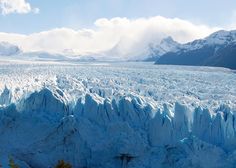 the glacier is very large and blue in color