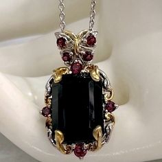 Stunning Australian Black Tourmaline Stone Set In A Sterling Silver With 14k Yg And Platinum Overlay Pendant And Beautifully Accented With Orissa Rhodolite Stones. Sitting Atop The Pendant Is A Butterfly Accented To Match The Pendant Detailing. Marked 925 Pendant Measures 1 3/16” Long From Butterfly To Bottom Of Pendant Comes With 20” Sterling Silver Chain Black Tourmaline Stone, Tourmaline Stone, Black Tourmaline, A Butterfly, Sterling Silver Chain, Stone Settings, Sterling Silver Chains, Size 20, Womens Jewelry Necklace