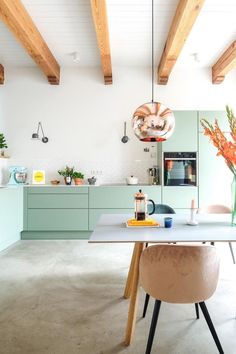 the kitchen is clean and ready to be used for dinner or breakfast time, as well as other things that are on the table