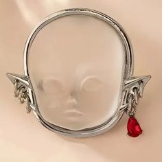 * Brand New! (Removed From Packaging For Photos) * This Unique Ring Features A 3-D Doll Face Accented With A Red Rhinestone Earring On One Side And Silver Hoop Earrings On The Other. * Adjustable To Fit Most Sizes * Smoke Free Environment Tags: Weird Whimsical Creepy Spooky Halloween Goth Punk Babydoll Strange Unusual Statement Halloween Horror Costume Jewelry Retro Strange Jewelry, Strange Rings, Red Rhinestone Earrings, Horror Costume, Weird Jewelry, Halloween Goth, Punk Emo, Goth Jewelry, Gothic Punk