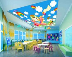 a classroom with tables and colorful chairs in the center, painted on the ceiling by children's artwork