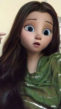 a close up of a doll with big eyes