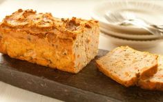 two slices of bread sitting on top of a cutting board