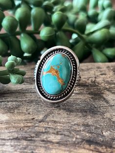 Here we have a beautiful sterling silver ring with turquoise. This item was made by MP. The ring size is 7.0.  Type: Ring  Metal: Silver   Purity: Sterling (.925)  Weight: 8.7 Grams  Measurements (Face MM): 24.70 x 19.12  Stone/s: Turquoise  Maker: MP  Size: 7.0  Item#: R0383 Classic Sterling Silver Turquoise Ring With Polished Finish, Handmade Classic Sterling Silver Turquoise Ring, Handmade Classic Turquoise Sterling Silver Ring, Bohemian Turquoise Sterling Silver Ring With Polished Finish, Classic Sterling Silver Turquoise Ring Stamped 925, Southwestern Sterling Silver Ring With Large Stone, Southwestern Sterling Silver Rings With Large Stone, Turquoise Rings With Polished Finish, Bohemian Turquoise Ring As Gift With Polished Finish