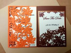 an orange and brown wedding card with the word save the date on it