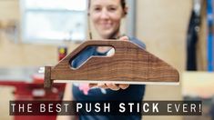 a woman holding a piece of wood with the words, the best push stick ever