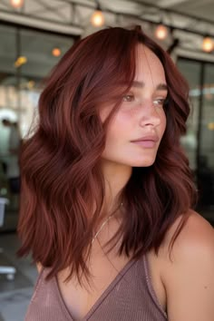 Craving a hair color that’s rich, indulgent, and utterly irresistible? Look no further than chocolate cherry brown! This luxurious shade combines the warmth of chocolate brown with a tantalizing hint of cherry red, resulting in Dark Brunette Red Balayage Hair, Cherry Brown Balayage Brunettes, Hint Of Red Hair Color, Brown Copper Hair Balayage, Cherry Copper Hair Color, Cinnamon Auburn Hair Color, Warm Brown Red Hair, Hair Color Ideas For Brunettes Red, Light Cherry Brown Hair