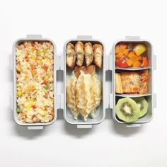 three plastic containers filled with food on top of a white table next to each other