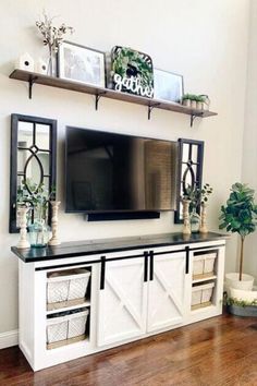 how to decorate around a TV - tv wall decor ideas Large Wall With Tv, How To Decorate Tv Stand, Wall With Tv, Living Room With Tv, Tv Wall Ideas, Interior Farmhouse, Iron Chairs