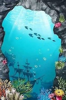 an underwater scene with fish and corals in the water, under a rock arch