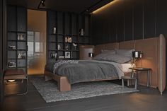 a bedroom with black walls and wooden flooring has a large bed in the middle