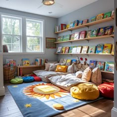 a child's bedroom with lots of books on the shelves