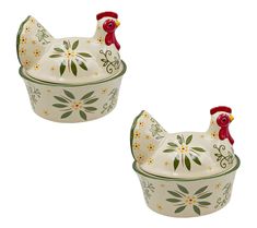 two bowls with roosters painted on them, one is white and the other is green