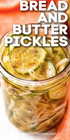 a jar filled with sliced cucumbers on top of a table