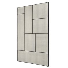 a white wall with squares on it and black frame around the edges, against a white background