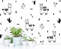 wall decals with llamas, cactuses and cacti on them