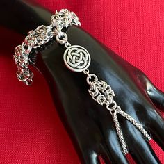 Handmade. Maille Bracelet With Celtic Knot Charm . Bracelet Is Adjustable . Will Fit 5 Inch To 7.75 Inch Wrist . I Use Stainless Steel Hoops To Create Those Maille Bizantine Links . Stainless Steel Trinity Trisquel Triquetra Celtic Knot Coin Charm . Lobster Clasp . Chain Is Nickel Free , Allergy Free , Hypoallergenic , No Itching . Tags : Handflower / Belly Dancer / Slave Bracelets / Hand Piece Bracelet / Boho / #Bohemian / Bohochic / Goth / #Gothic / Victorian / Queen / Medieval / Viking / Celt Victorian Queen, Witch Fairy, Medieval Fair, Celtic Moon, Punk Pins, Biker Gifts, Hand Flowers, Gothic Victorian, Belly Dancer