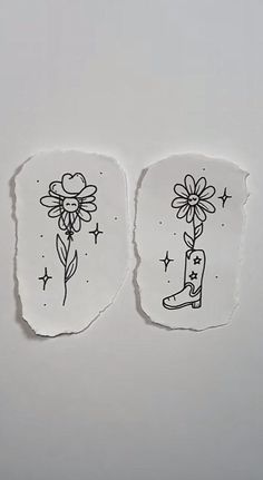 two pieces of torn paper with drawings of boots and flowers on them, one has a flower sticking out of it