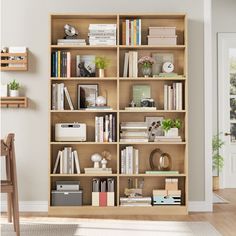 a wooden bookcase filled with lots of books on top of a hard wood floor