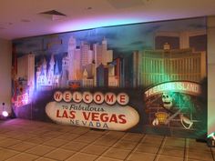 the entrance to las vegas is lit up with neon lights