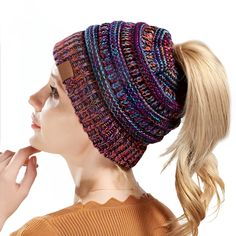 Looking for a stylish and functional winter accessory? Look no further than our Crochet Beanie with Ponytail Hole ! Have you ever wanted to wear a cozy beanie but didn't want to sacrifice your ponytail? Well, now you don't have to! Our Knit Beanie Hat With Ponytail Hole is the perfect solution.
Features of the Crochet Beanie with Ponytail Hole :

 	Handcrafted Quality: Each beanie is handmade with care, ensuring excellent quality.
 	Vibrant Color Choices: With a large variety of colors to choose from, you can easily find a beanie (or two) to match your wardrobe.
 	Ponytail Hole: The unique feature of a hole built into the crown makes this beanie the perfect compliment to your messy bun.

Specifications:

 	Composition: Made with 100% acrylic for ultimate warmth and comfort.
 	One size fits Cozy Multicolor Beanie For Outdoor, Adjustable Multicolor Beanie Cap, Cozy Multicolor Outdoor Beanie, Multicolor Beanie For Beach, One Size, Multicolor One-size Beanie For Outdoor, Ponytail Beanie, Knit Beanie Hat, Crochet Beanie, Winter Accessories