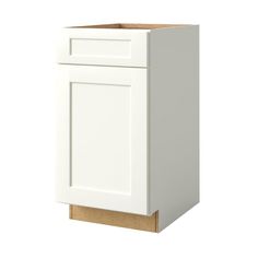 a white cabinet with a wooden base