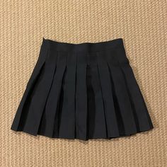 Black Pleated Mini Skirt Never Worn Size Medium In Perfect Condition Cheap Gray Mini Skirt For Summer, Black Short Tennis Skirt For Spring, Black Pleated Skort For Summer, Summer Black Pleated Skort, Black High Waist Pleated Tennis Skirt, High Waist Black Pleated Skort, Black Pleated Mini Tennis Skirt, Black Pleated Tennis Skirt For Party, Black Pleated Tennis Skirt For Summer