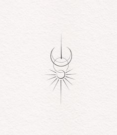 a black and white drawing of a crescent with a sun in the middle on paper