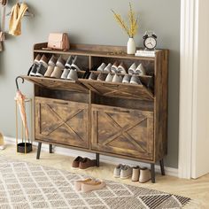 a wooden shoe rack filled with pairs of shoes