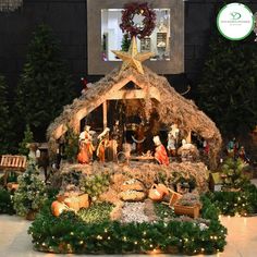 a nativity scene with lights and decorations