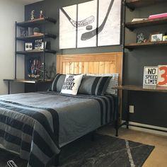 a bed sitting in a bedroom next to a book shelf