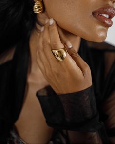 Empowering and bold. The Diana Ring is designed to pay homage to Wonder Woman's iconic cuffs, statement and fashion-forward. 18k Gold Coated Thickness: 30mm Hypoallergenic & Non-tarnish View Ring Size Guide Style Tips: The Diana Ring is perfectly worn as is; but for a more eye-catching shine of gold, pair it with our Capri Necklace. Free shipping for US and PH orders over $100.