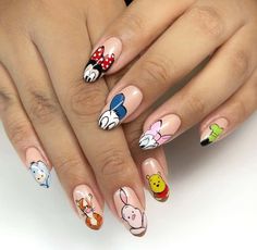 Visit this post to find cute Disney nail designs. There's nothing simple about these disneyland acrylic. easy, Find easy disney nails art ideas for long or short trendy looks. Enjoy even a pink nail aesthetic. A collection of disney nail designs. Enjoy disney nail designs simple, disney nail designs acrylic, disney nail designs princesses, cute disney nail designs, disney nail designs minnie mouse, disney nail designs long and walt disney nail designs. Simple Disney Nails, Disney World Nails, Nails June, Disney Themed Nails, Disney Princess Nails, Disneyland Aesthetic, Cartoon Nail Art, June Nails