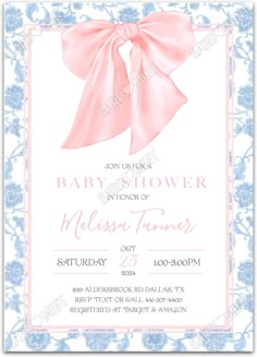 the baby shower is in pink and blue with a large bow on it's head