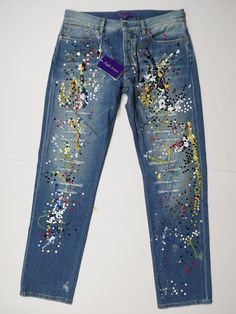 a pair of blue jeans with sequins on them