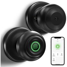 an image of two black door knobs with green light on the front and side