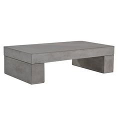 the concrete coffee table is made from cement blocks