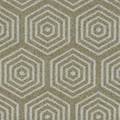 an abstract pattern made up of hexagonal shapes in grey, white and beige