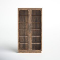 an old wooden bookcase with glass doors on the front and bottom shelves, isolated against a white background