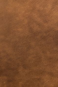 a brown leather textured surface that looks like it could be used as a background