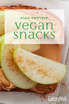 an open sandwich with apples and peanut butter on it, topped with vegan snacks